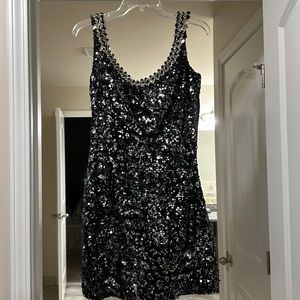 Beautiful size 12 Tony Bowls black and silver sequins dress.